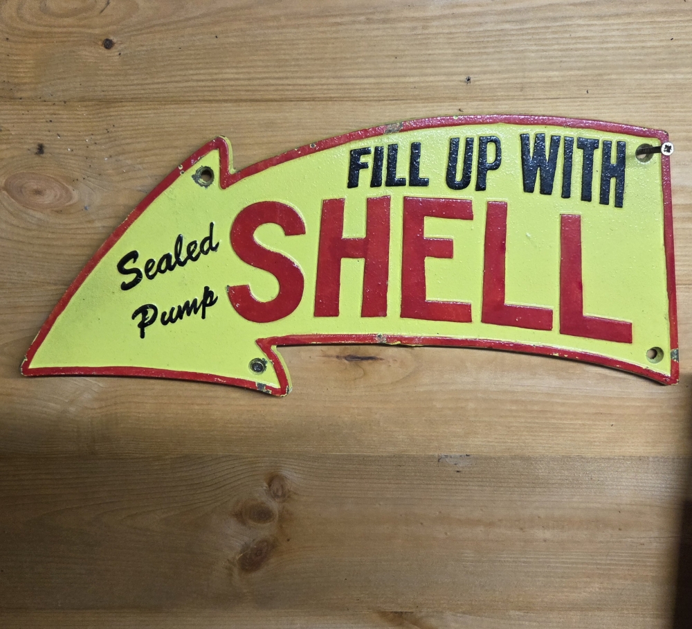 SHELL cast pointer sign 