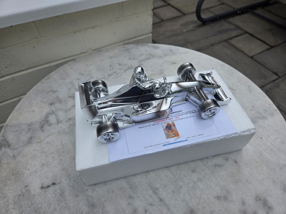Mansell "Taxi for Senna " cast model , signed 1/12th model No.208 of 555